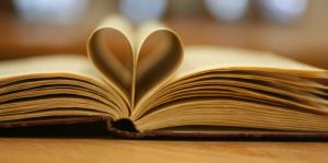 Book pages folded to form a heart